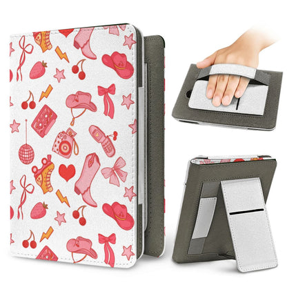Coquette Cowgirl Kindle case — elastic hand strap and fold-out stand on the back