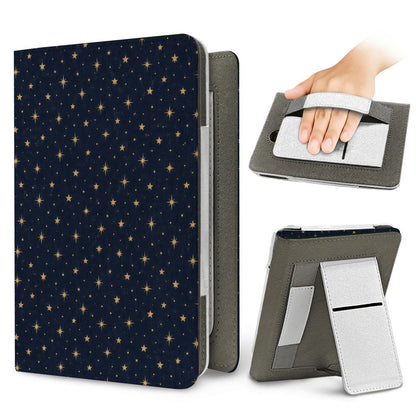 Gold Stars Navy Kindle case — elastic hand strap and fold-out stand on the back