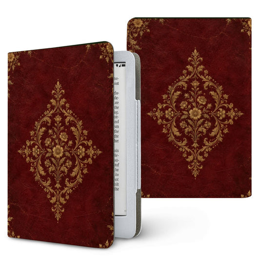 Oxblood Gilded Binding Kindle case — gold-tooled filigree medallion on oxblood, printed front and back