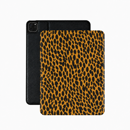 Amber cheetah iPad case in burnt orange vegan Saffiano leather — black spots on amber
