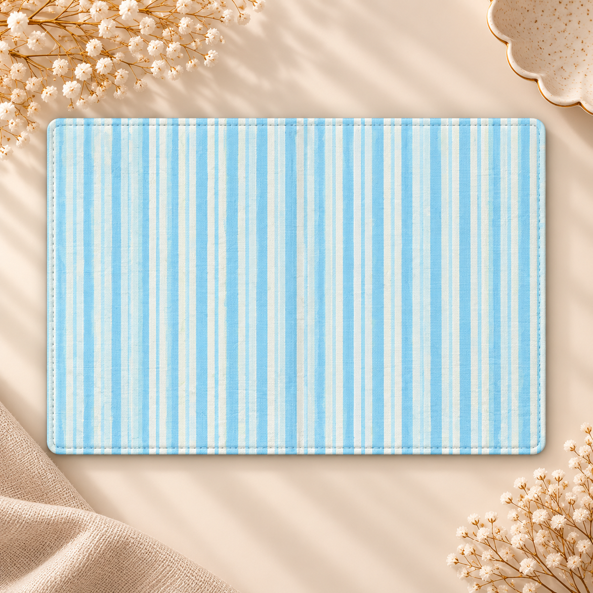 Blue Ticking Stripe Kindle case opened flat, front and back — sky blue and white vertical stripes