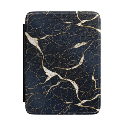 Near-black navy Kindle Paperwhite case with gold cracks and white marble seams front cover — Maison Noir gift