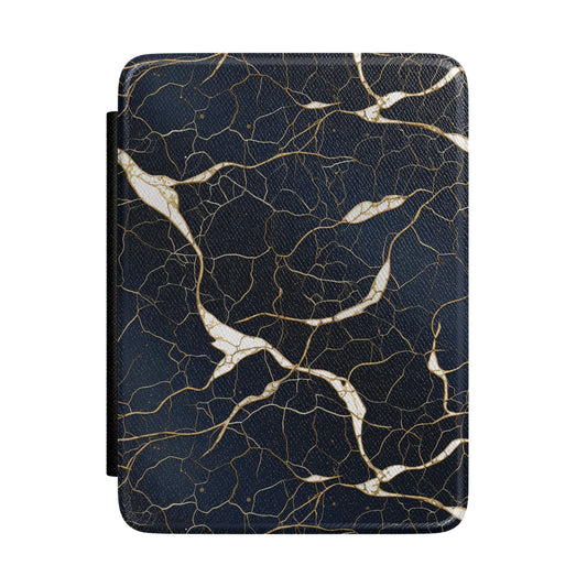 Near-black navy Kindle Paperwhite case with gold cracks and white marble seams front cover — Maison Noir gift