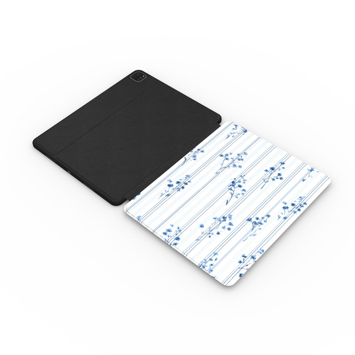 Blue floral pinstripe iPad case with the Apple Pencil charging in its cutout