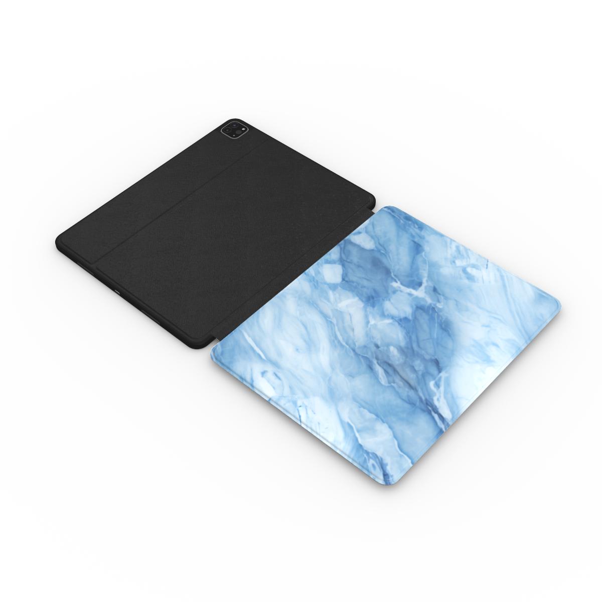 Blue marble iPad case with the Apple Pencil in its slot