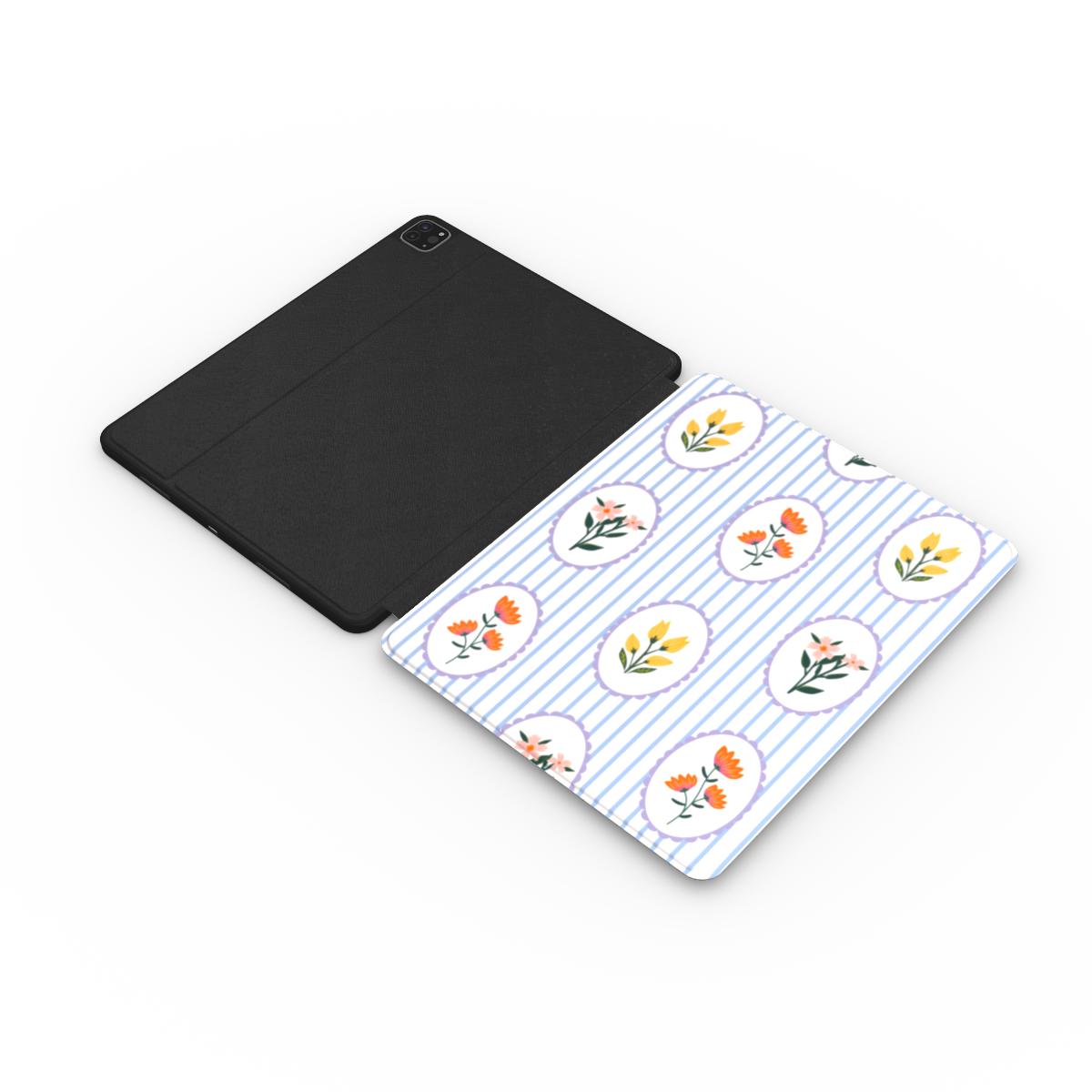 Blue stripe floral cameo iPad case with the Apple Pencil charging in its cutout