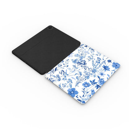 Blue wildflower iPad case with the Apple Pencil charging in its cutout