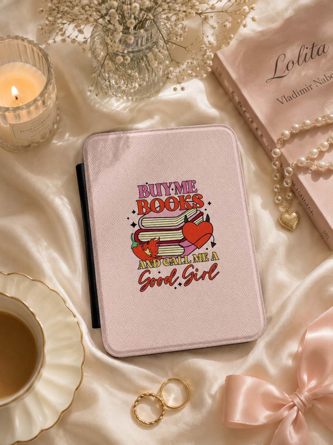 Blush book stack sticker Kindle case open showing black interior — Coquette Reader
