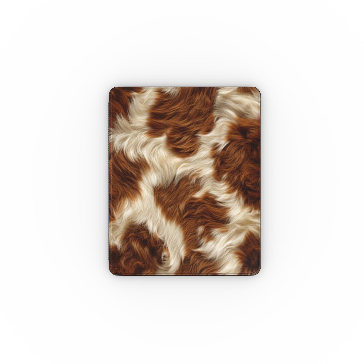 Chestnut cowhide iPad case open, showing the stand fold and interior