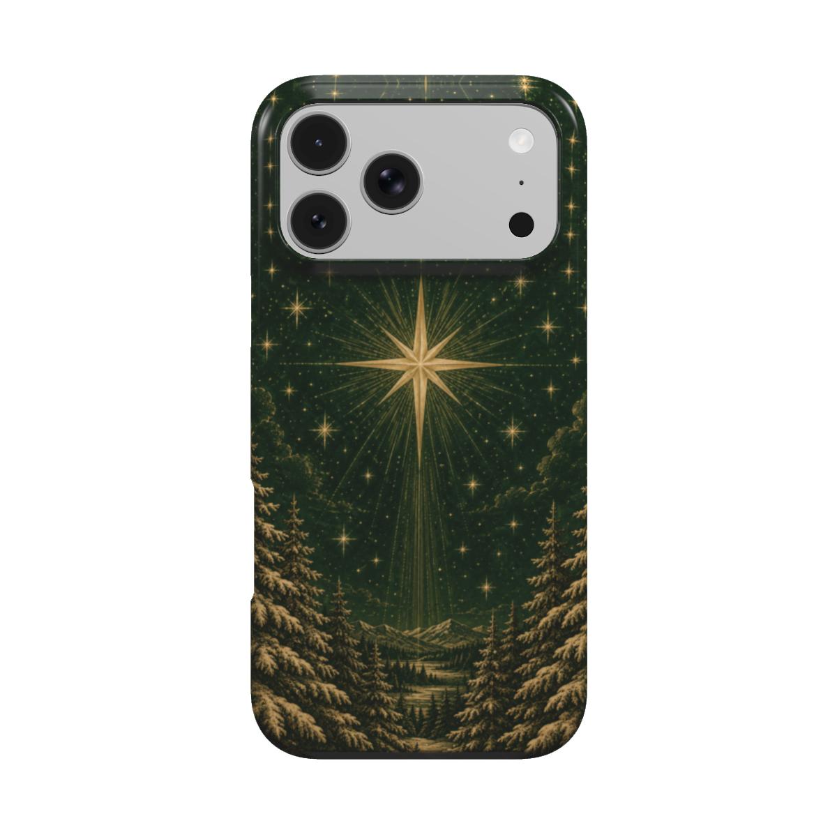 Christmas star iPhone case — gold star over a snowy pine forest on deep green, MagSafe phone case, front view