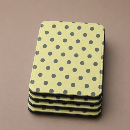 Citron Kindle case with charcoal dots open showing black interior — Atelier