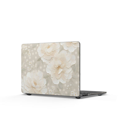 Cream peony MacBook case shown open with the ports and vents left clear