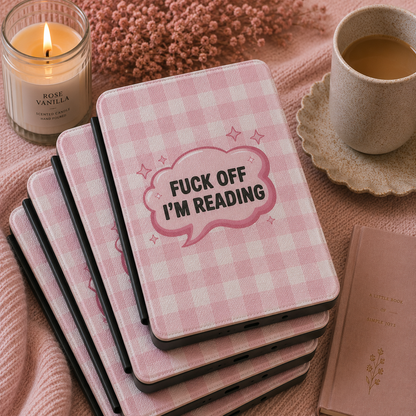 Fuck Off I'm Reading pink gingham Kindle case shown at an angle