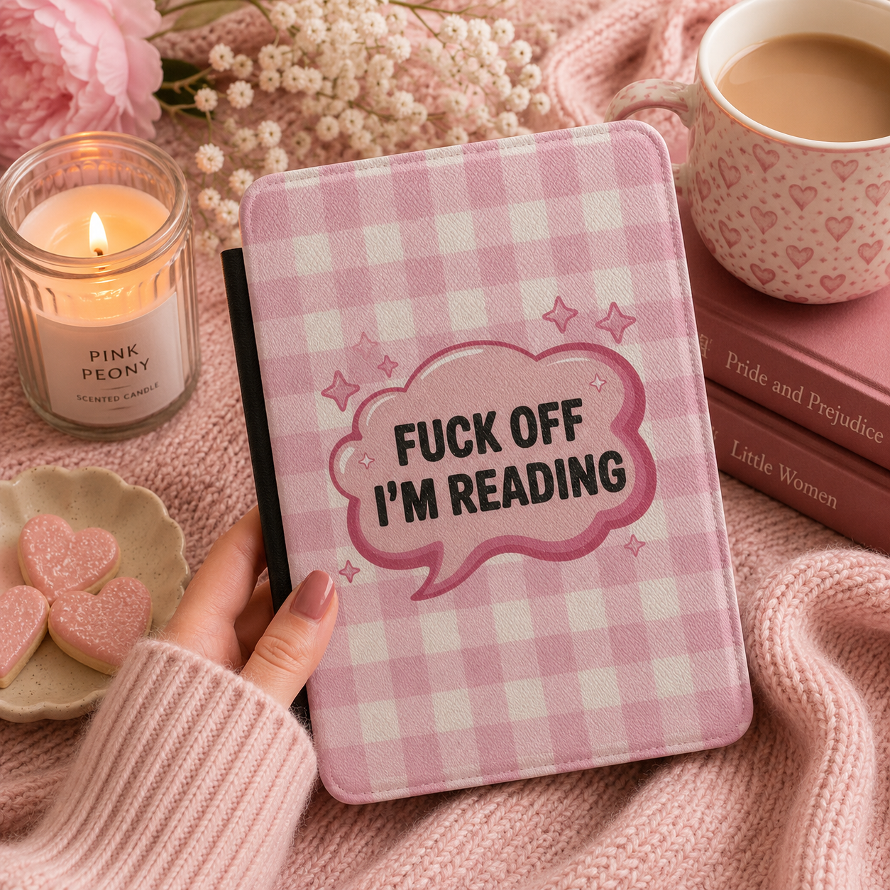Close-up of pink gingham Saffiano Fuck Off I'm Reading Kindle case with glossy speech bubble