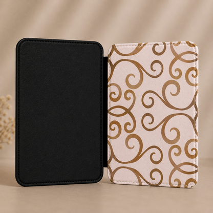 Gold scrollwork Kindle case open showing black interior — Maison Noir blush