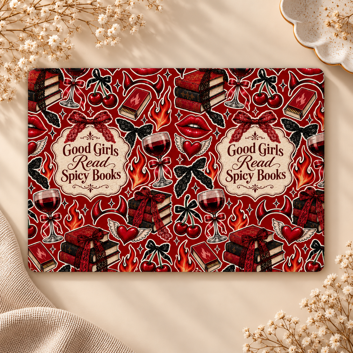 Good Girls Read Spicy Books Kindle case opened flat, front and back — slogan plaque, books, wine and cherries on red