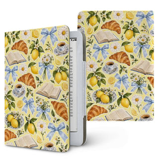 Lemons & Croissants Kindle case — lemons, croissants, espresso cups and blue bows on yellow, printed front and back