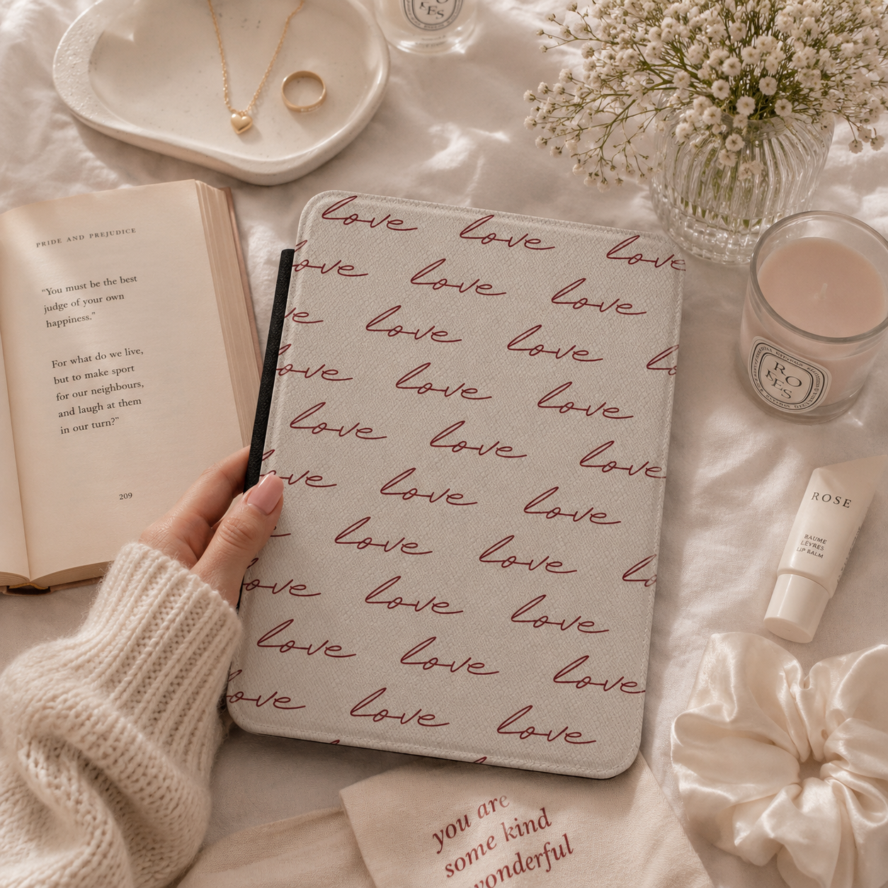 Cream love script Kindle case with elastic hand strap — Quiet Bookish burgundy print