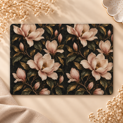 Midnight Magnolia Kindle case opened flat, front and back — blush magnolias and gold-edged leaves on black