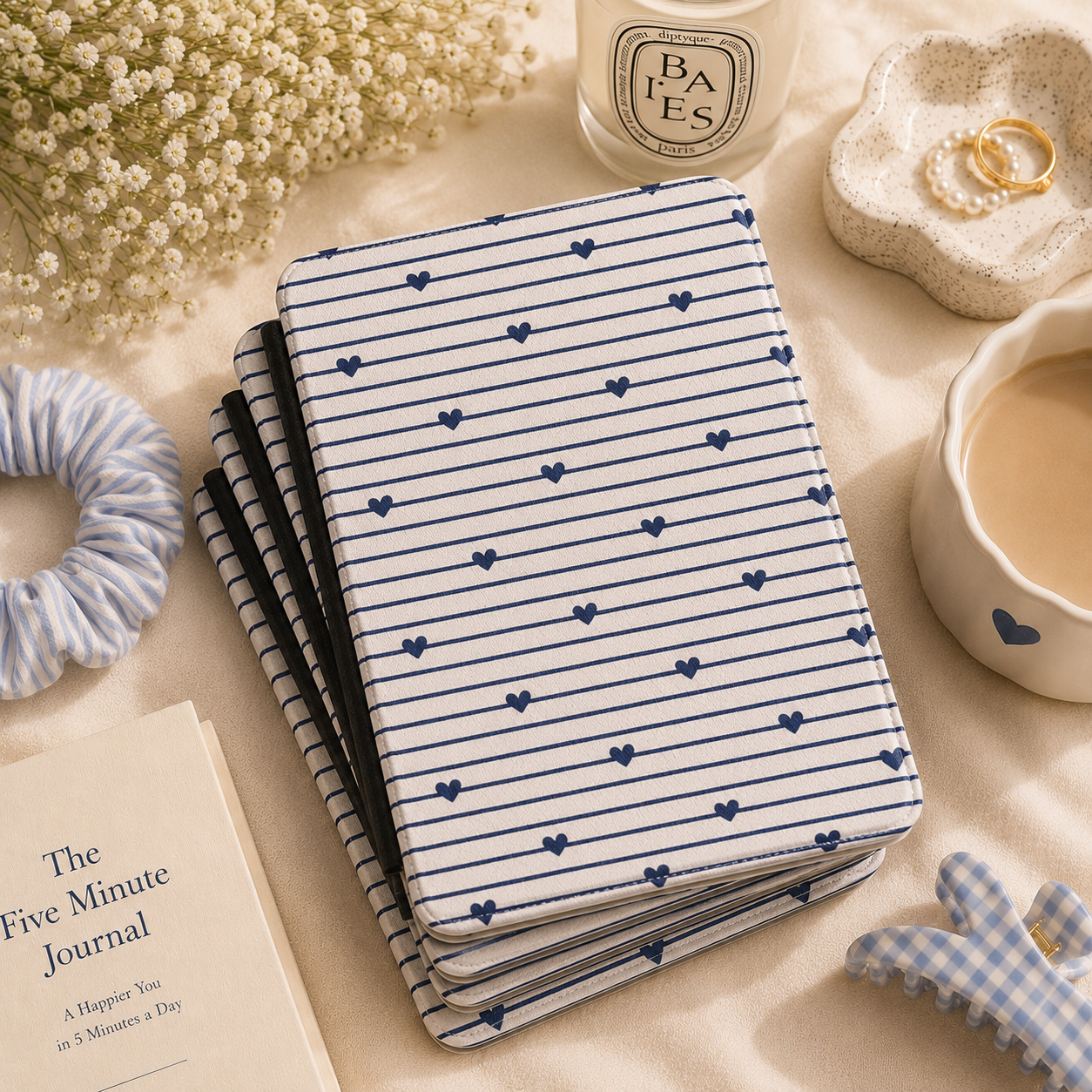 Close-up of Navy Stripe Hearts Saffiano Kindle case