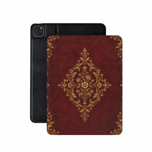 Oxblood Gilded Binding iPad case — gold-tooled filigree medallion on oxblood, shown front and back