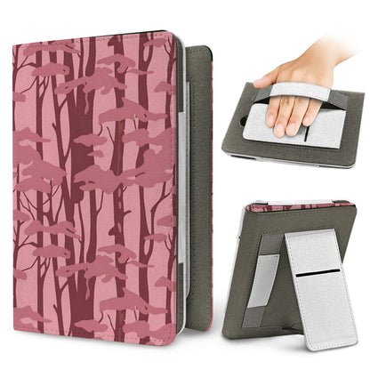 Pink Forest Camo Kindle case — elastic hand strap and fold-out stand on the back