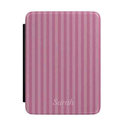 Mauve-pink stripe Kindle Paperwhite case with personalized name in white script front cover — Coquette Reader custom gift