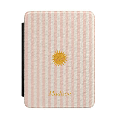Blush and cream stripe Kindle Paperwhite case with sleeping sun and personalized name in gold script front cover — Coquette Reader custom gift