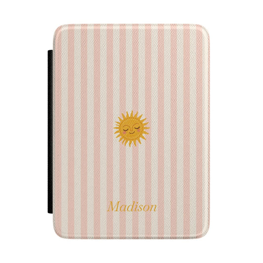 Blush and cream stripe Kindle Paperwhite case with sleeping sun and personalized name in gold script front cover — Coquette Reader custom gift