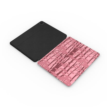 Pink forest camo iPad case with the Apple Pencil charging in its cutout
