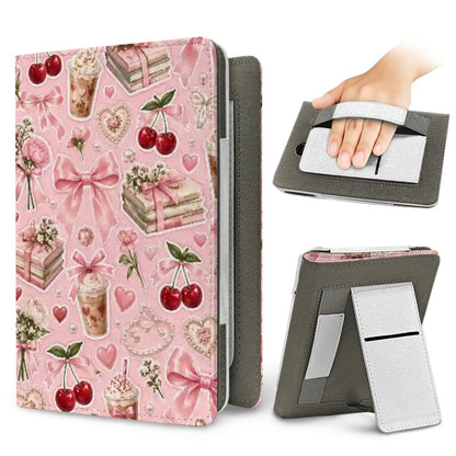 Pink Lattes & Cherries Kindle case — elastic hand strap and fold-out stand on the back