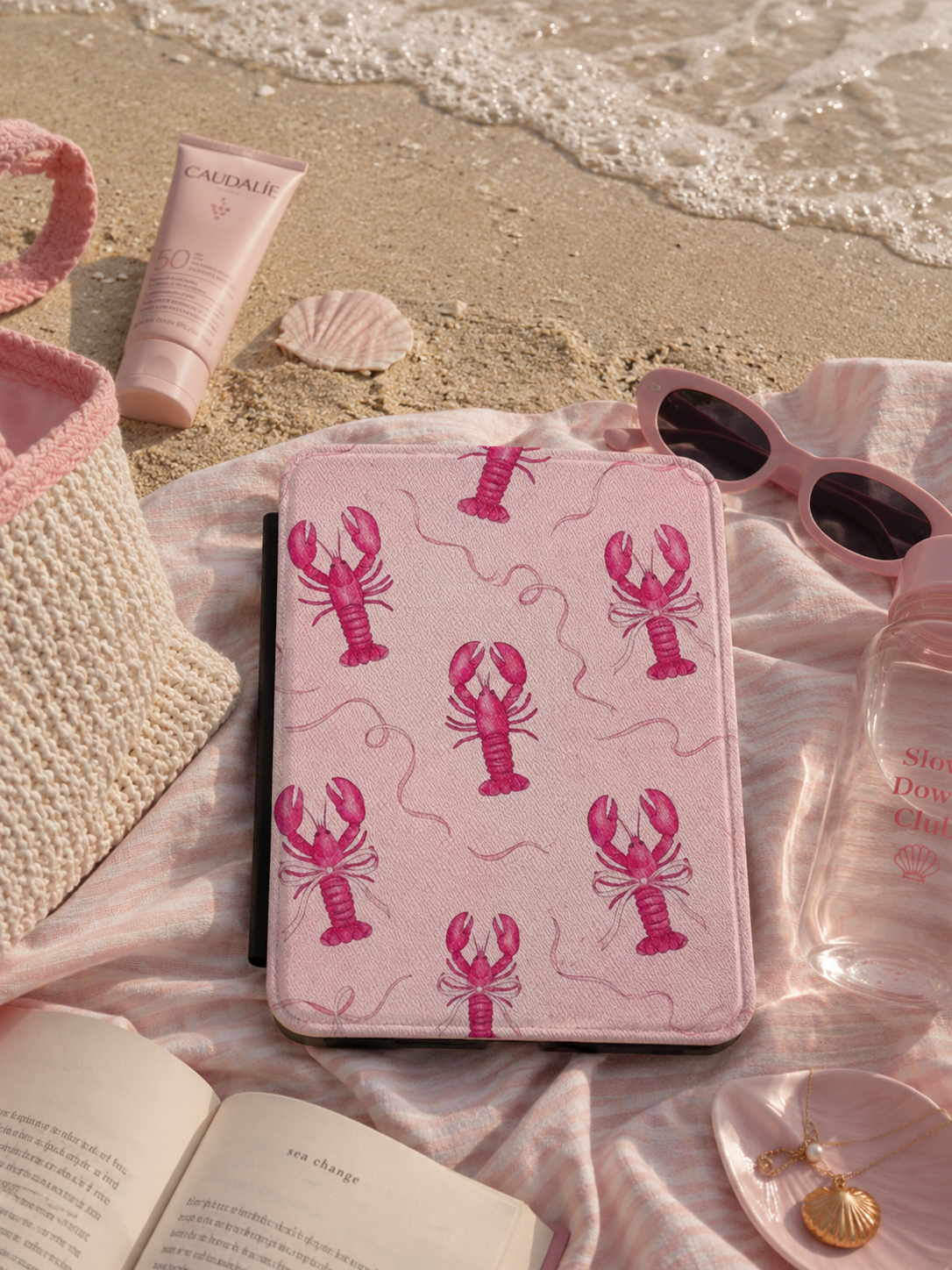 Pink lobster Kindle case open showing black interior — Atelier coastal print