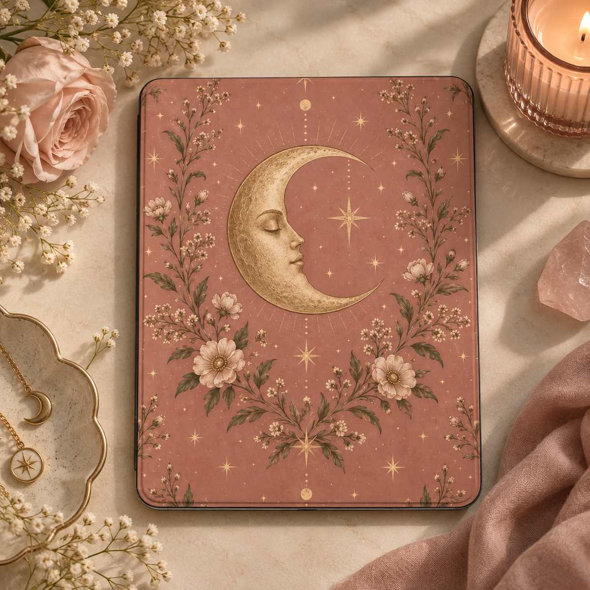 Rose Crescent Moon iPad case styled with a candle, a pink rose and baby's breath