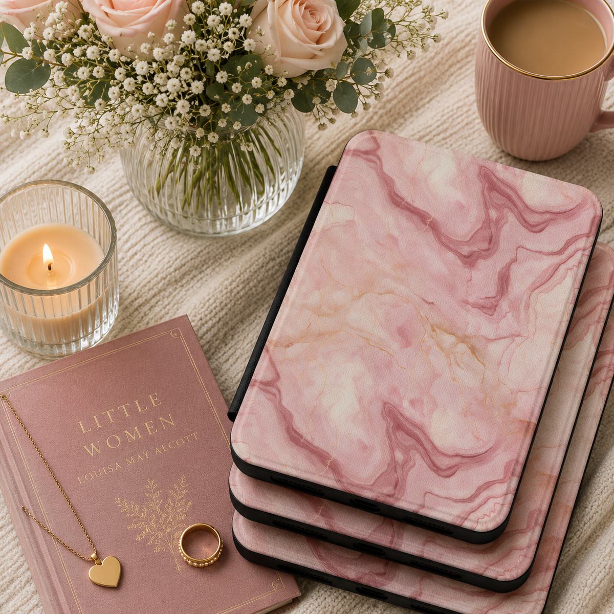 Rose marble Kindle case shown closed, with gold veining across the front cover