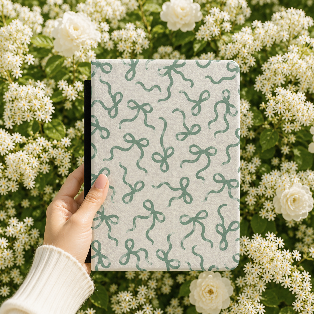 Sage Bows Kindle case open showing e-ink Kindle on right interior panel