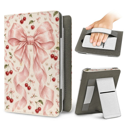 Satin Bow & Cherries Kindle case — elastic hand strap and fold-out stand on the back