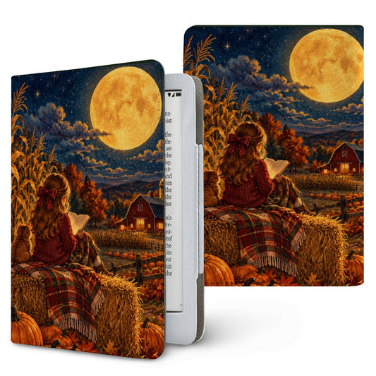 Harvest Moon Reader Kindle case — girl reading on a hay bale under a glowing harvest moon, printed front and back