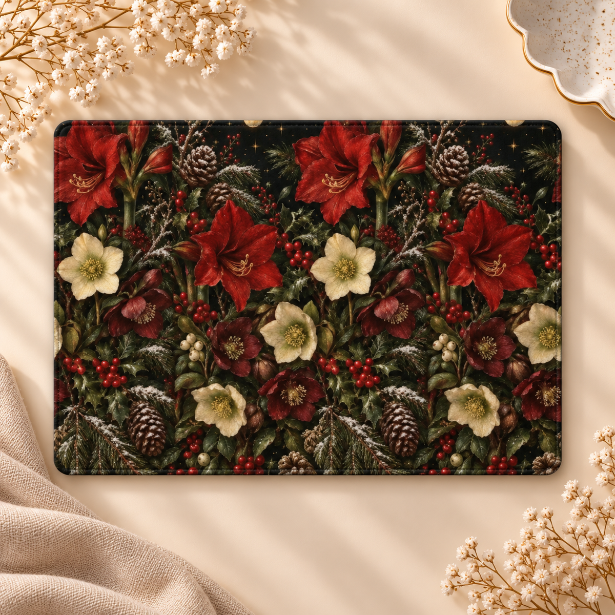 Winter Amaryllis Kindle case opened flat, front and back — red amaryllis, hellebores, holly berries and pine cones